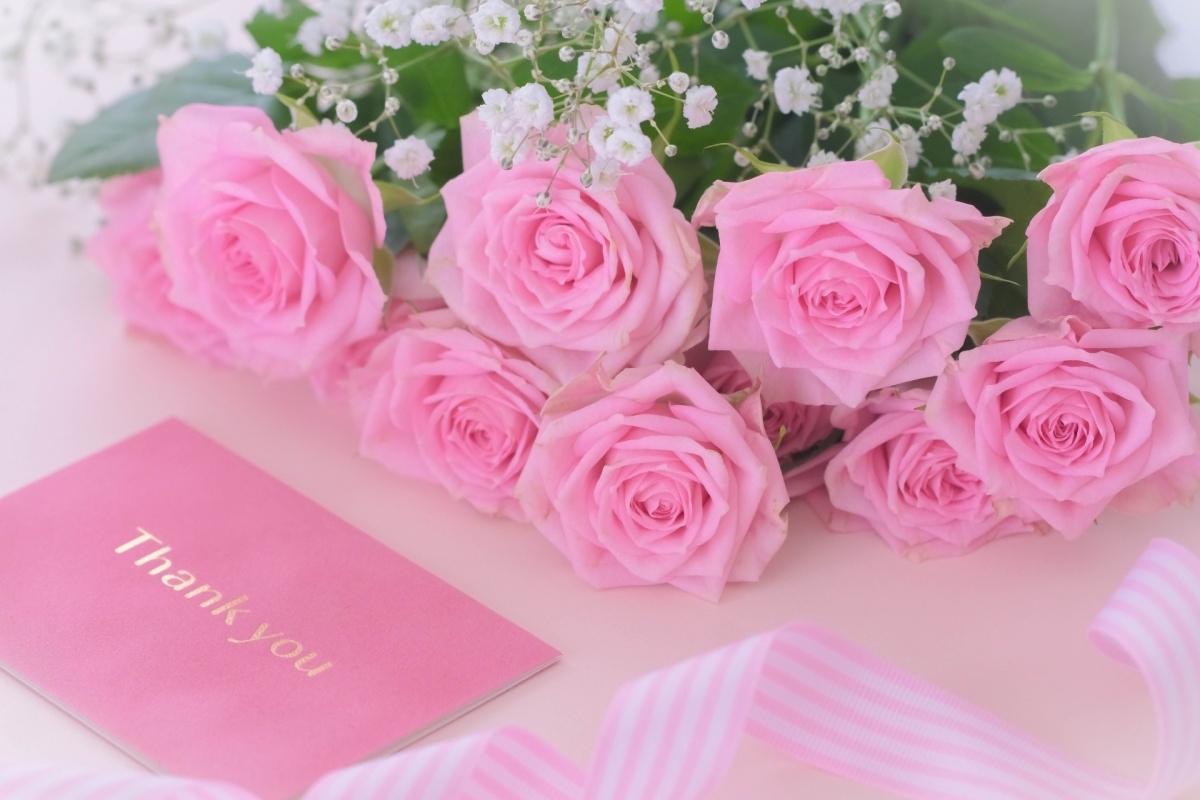 メッセージのイメージ（バラの花とメッセージカード）